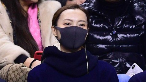 赛场边的深情守望：李晓旭爱妻变身摄影师