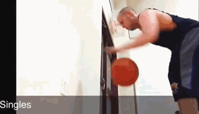 篮球运球基本功与进阶训练全攻略 篮球在球员腰间快速环绕,手臂舒展,球从腰后顺畅地交到另一只手中,动作行云流水充满节奏感